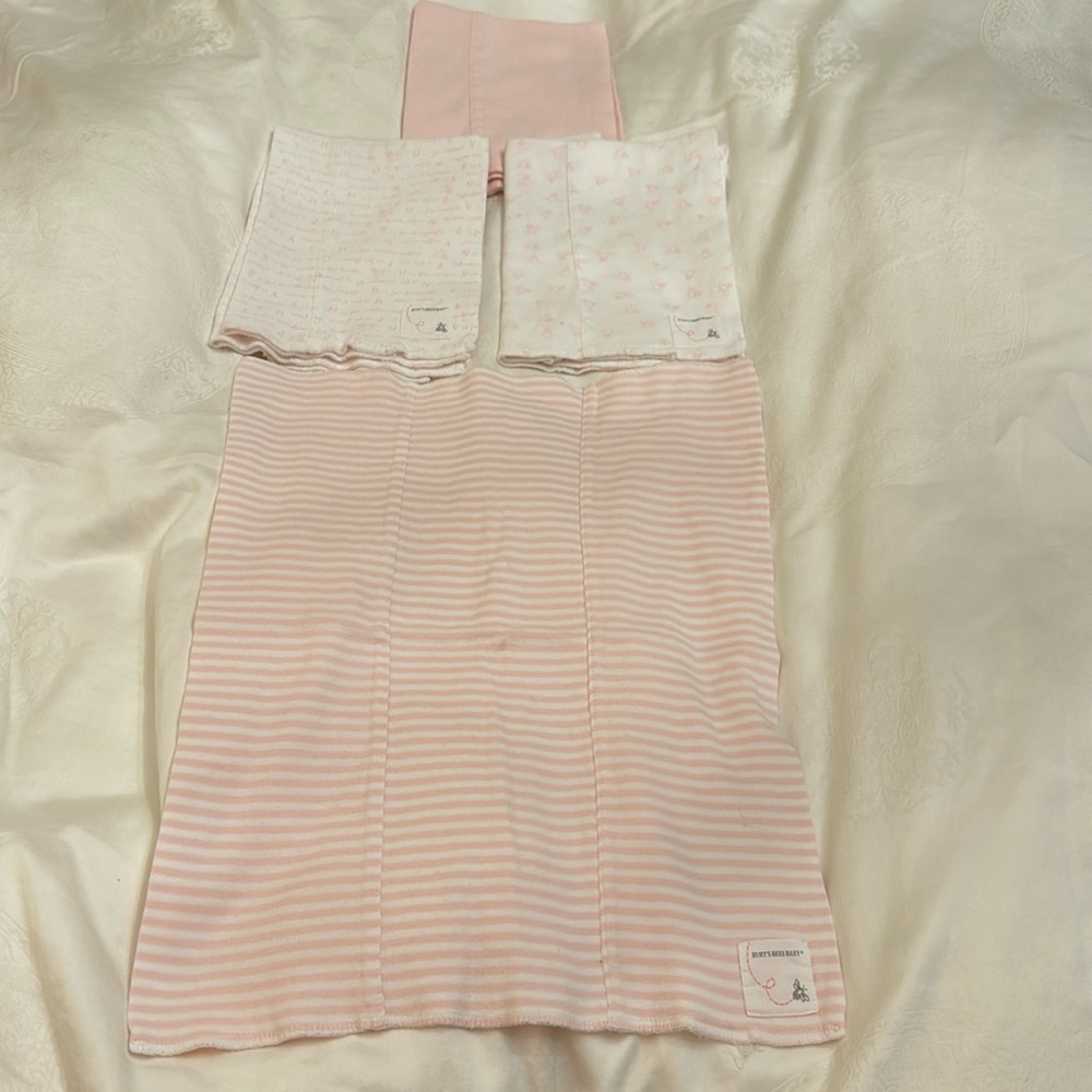 Burt’s Bees baby bibs (4).  Super soft no stains.